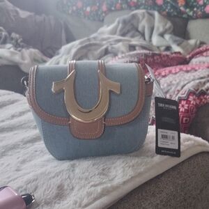 Chic Black Mini Bag with Sleek Design and Compact Size